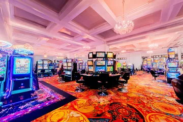 A laptop glowing with a bright login prompt in a minimalistic setup, symbolizing the protected access system at SOUL776.